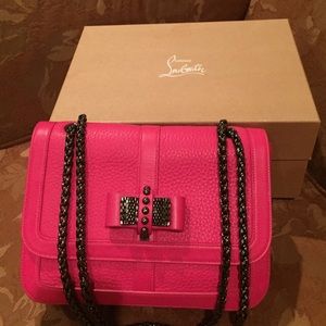 Hot pink Christian Louboutin bag